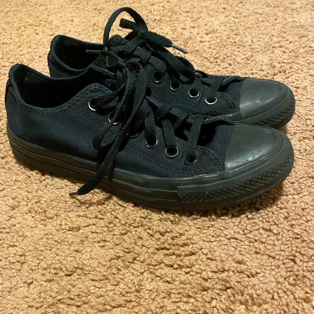 All black Converse Chuck Taylor Low tops